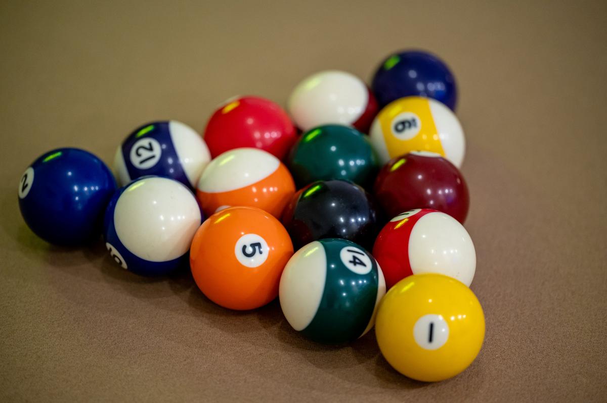 Racked billiard balls on the felt